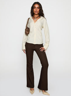 side view of model wearing Princess Polly Rush Hour Long Sleeve Top Yellow Stripe Full Sleeves V-Neck 