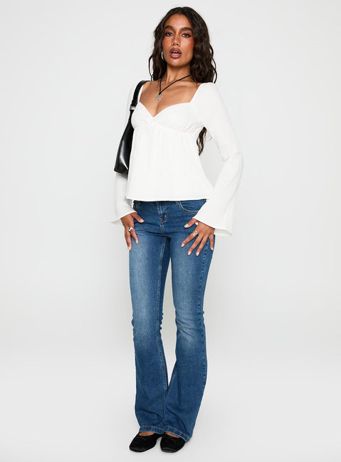 side view of model wearing Princess Polly Khalea Long Sleeve Top White Full Sleeves Sweetheart 