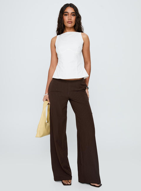Showcasing Khane Low Rise Wide Leg Pant Brown Pinstripe Petite in womens regular pants front view of model wearing
