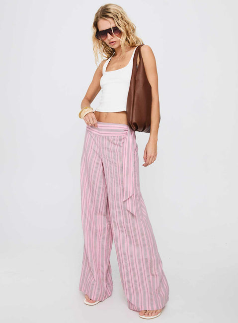 side view of model wearing Princess Polly Wave Dancer Tie Pant Pink Stripe High Rise Pants Pants 