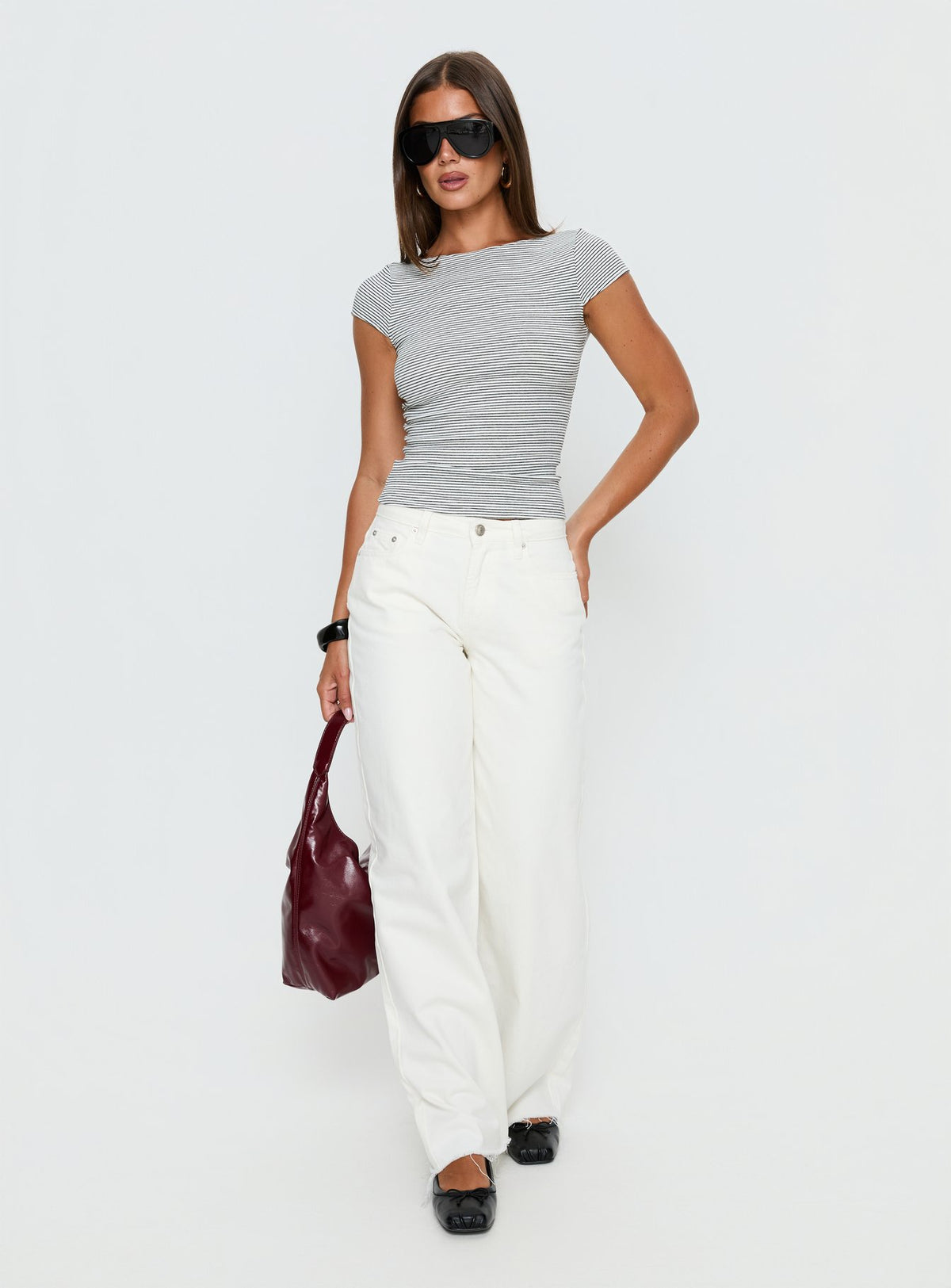 Showcasing the Darla Low Rise Straight Leg Jean White in womens-jeans front view of model wearing Princess Polly