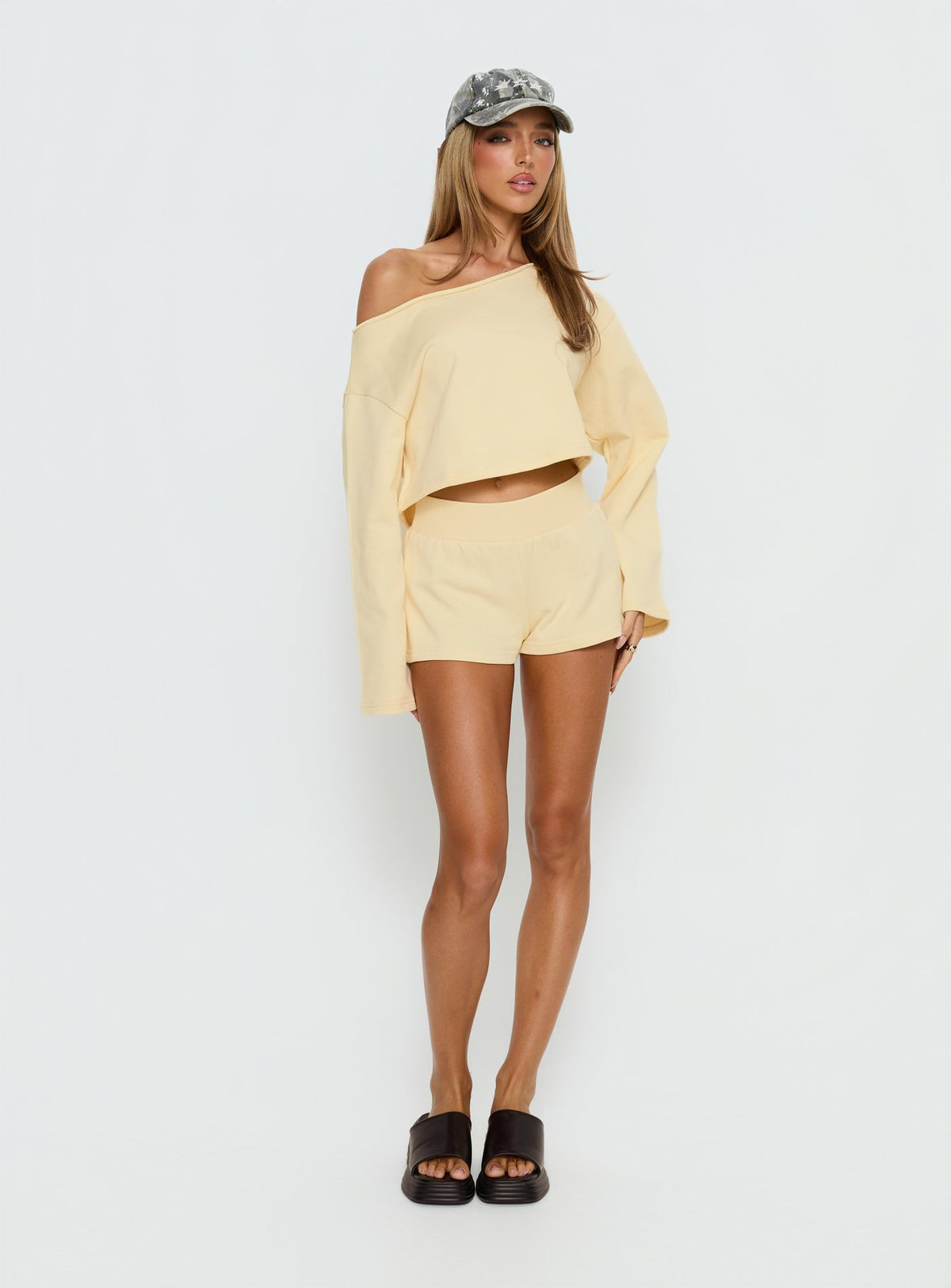 Designed with the Retreat Raw Edge Off Shoulder Jumper Buttercream womens-jumpers in short length product Princess Polly