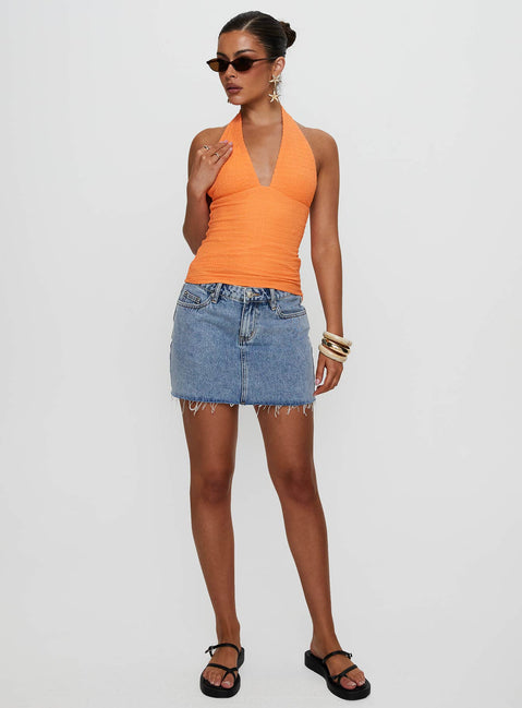 back view of model wearing Princess Polly Emaline Halter Top Orange Sleeveless Plunger 
