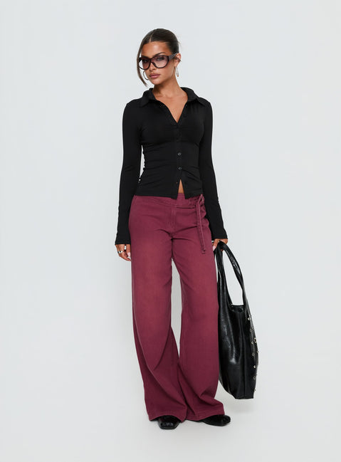 front view of model wearing Princess Polly Boxie Mid Rise Wide Leg Jeans Washed Burgundy Mid Rise Jeans Jeans 