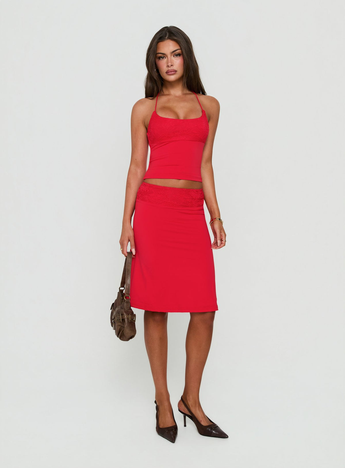 Showcasing the Zenaide Lace Detail Midi Skirt Red in womens-skirts front view of model wearing