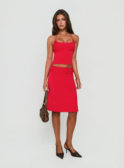 Showcasing the Zenaide Lace Detail Midi Skirt Red in womens-skirts front view of model wearing