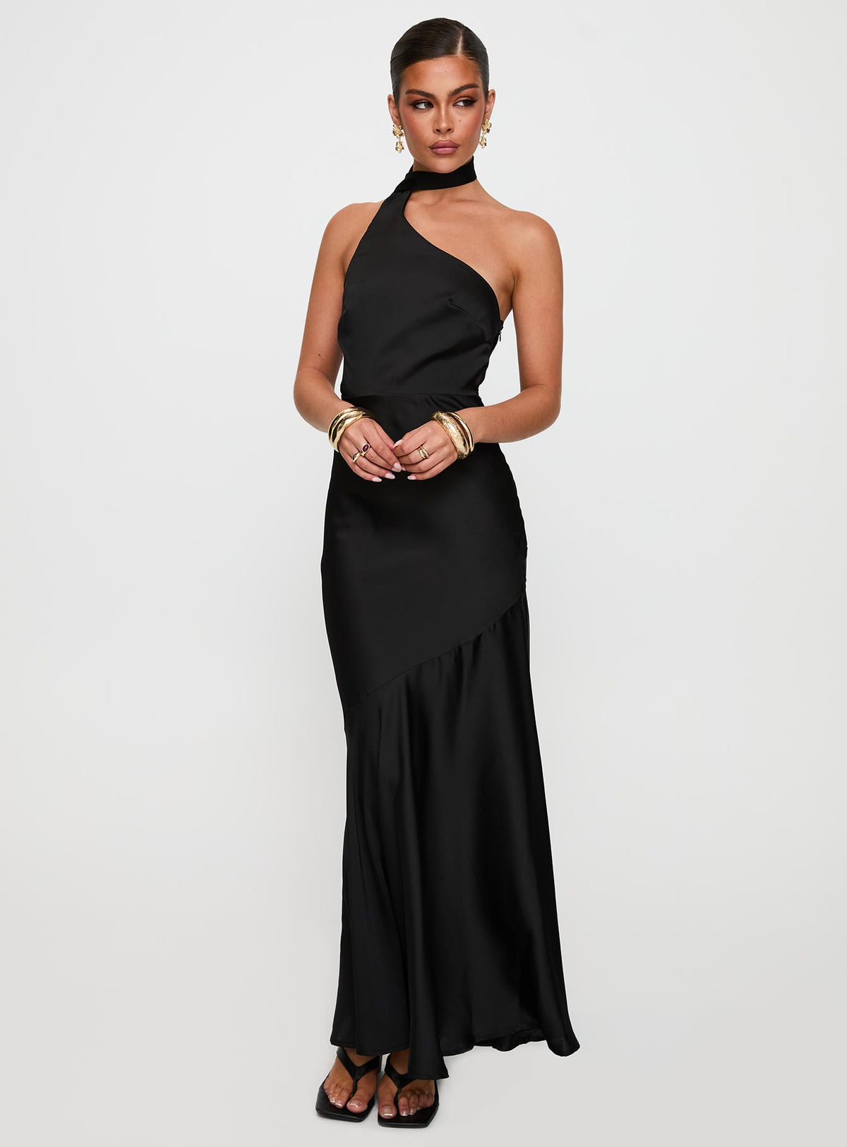 side view of model wearing Princess Polly Elixaire Scarf Maxi Dress Black Asymmetric Neckline 