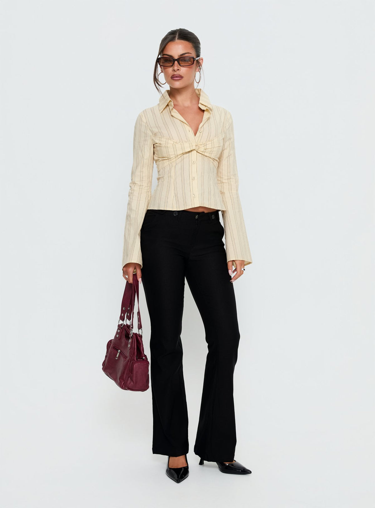 front view of model wearing Princess Polly Dariana Flare Pants Black Mid Rise Pants Pants 