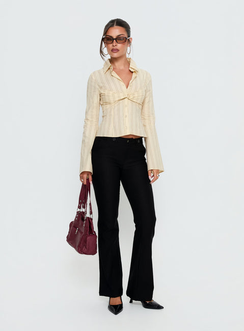 front view of model wearing Princess Polly Dariana Flare Pants Black Mid Rise Pants Pants 