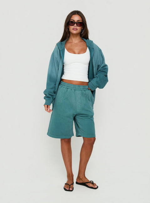 Explore the AT Fleece Baggy Jort in Washed Teal womens regular pants featuring mid-rise front view of model wearing Princess Polly