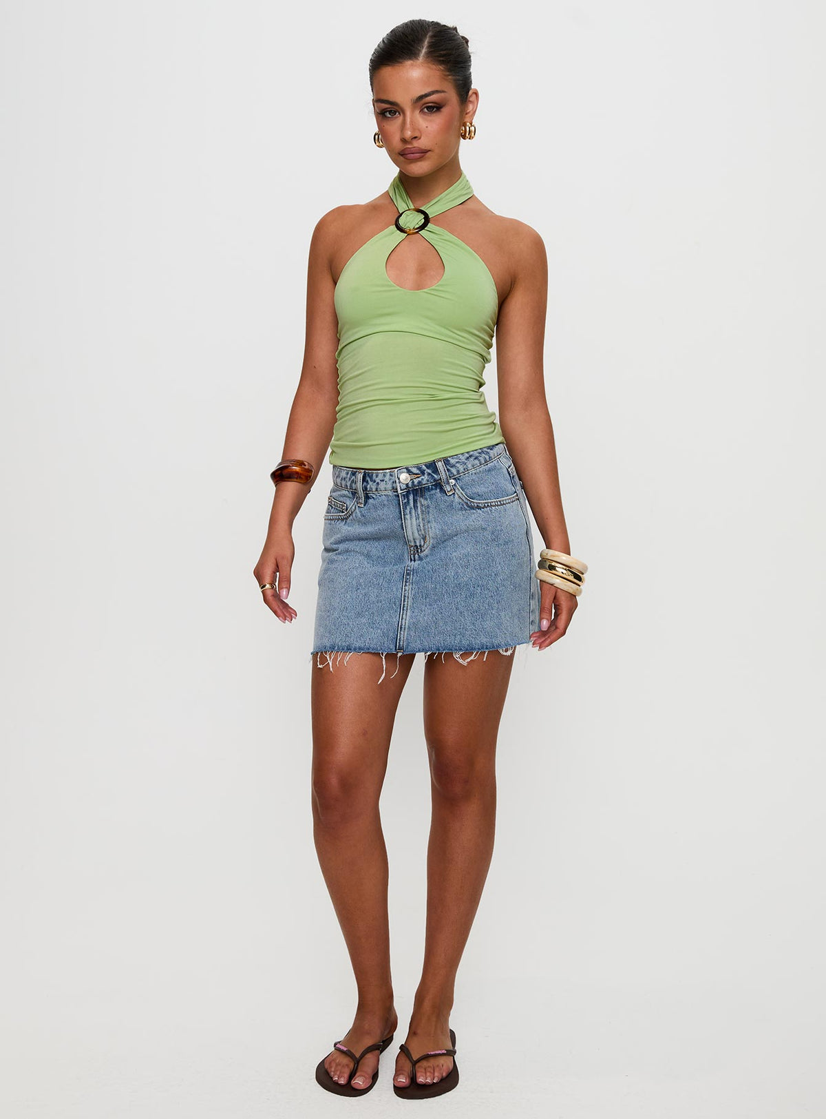 front view of model wearing Princess Polly Quell Top Green Sleeveless High Neck 