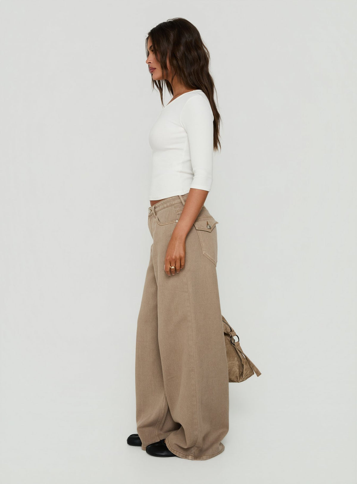 Crafted with Maryjo Mid Rise Super Baggy Jeans Washed Brown in womens-jeans featuring mid-rise waist side view of model wearing Princess Polly