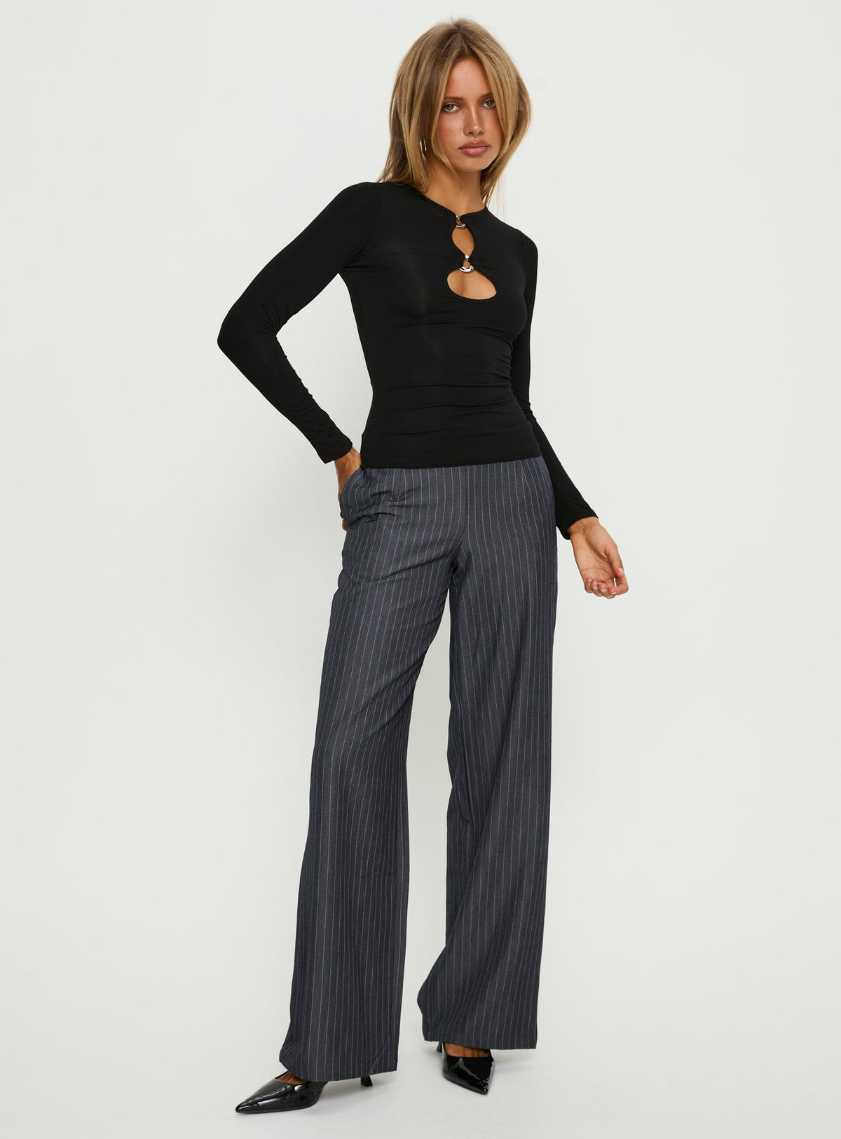 front view of model wearing Princess Polly Khane Low Rise Wide Leg Pant Charcoal Pinstripe Mid Rise Pants Pants 