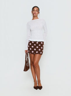   side view of model wearing Princess Polly Adelaida Mini Skirt Brown / Pink Polka Mini Skirts Skirts 