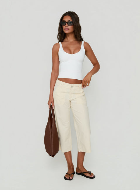Crafted from quality fabric, the Miska Wide Leg Capri Pants Off White in womens-regular-pants with mid-rise waist detail view of model wearing Princess Polly