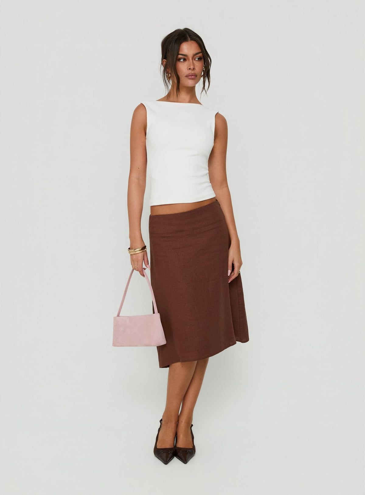 Showcasing the Such Delight Linen Midi Skirt Chocolate in womens-skirts front view of model wearing Princess Polly