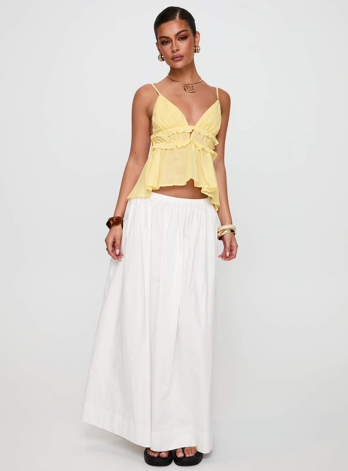 front view of model wearing Princess Polly Blondelle Frill Detail Top Yellow Sleeveless Plunger 