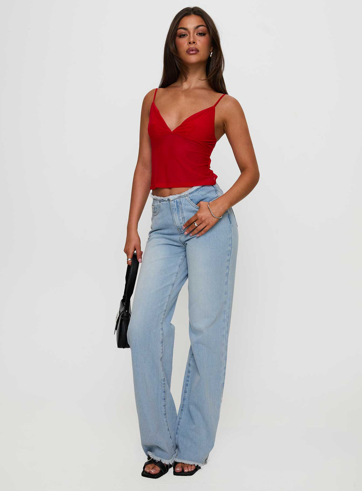 front view of model wearing Princess Polly Hawke Frayed Mid Rise Straight Leg Jeans Mid Blue High Rise Jeans Jeans 