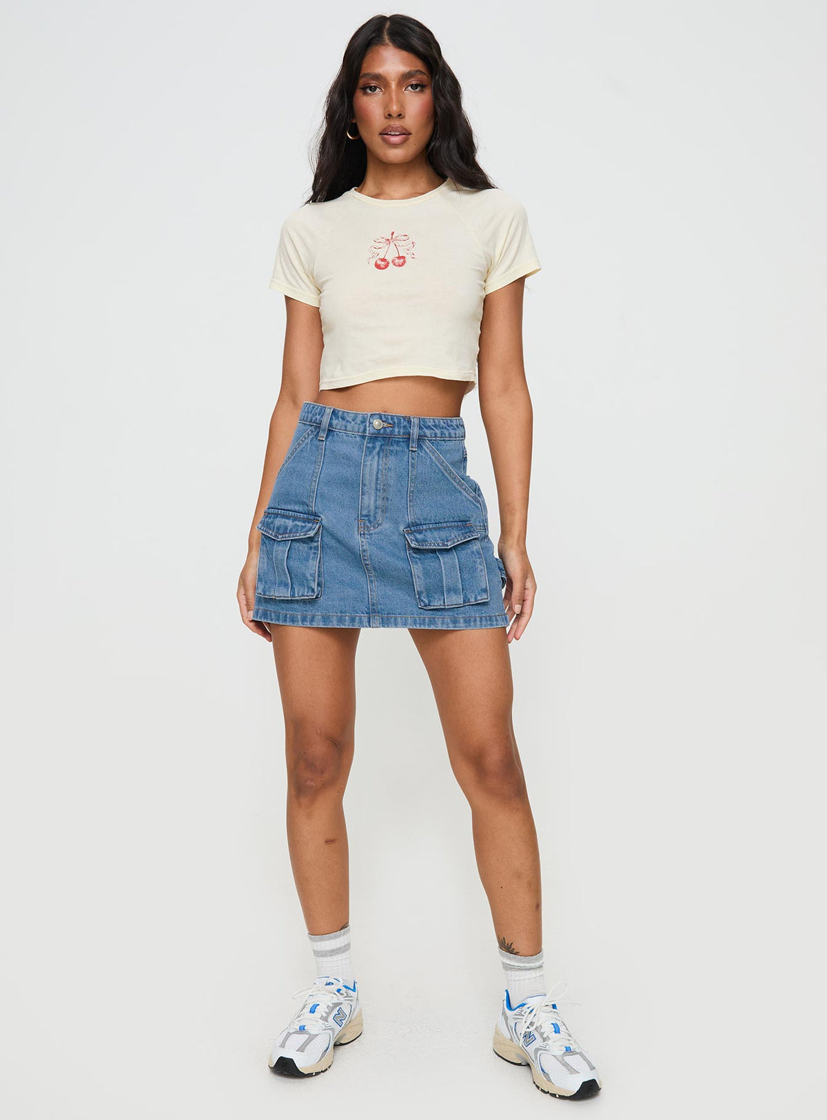   front view of model wearing Princess Polly Chillders Denim Mini Skirt Mid Wash Tall Mini Skirts Skirts 