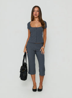 Showcasing the Mayvie Capri Pants Navy Check in womens regular pants with high-rise waist front view of model wearing