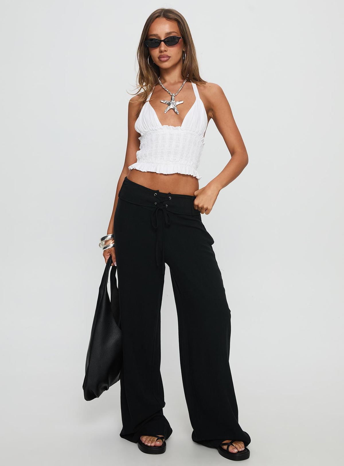 front view of model wearing Princess Polly Raymonde Pants Black High Rise Pants Pants 