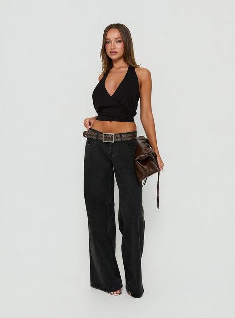 Showcasing the Picco Ultra Low Rise Wide Leg Jeans Washed Black in womens-jeans front view of model wearing