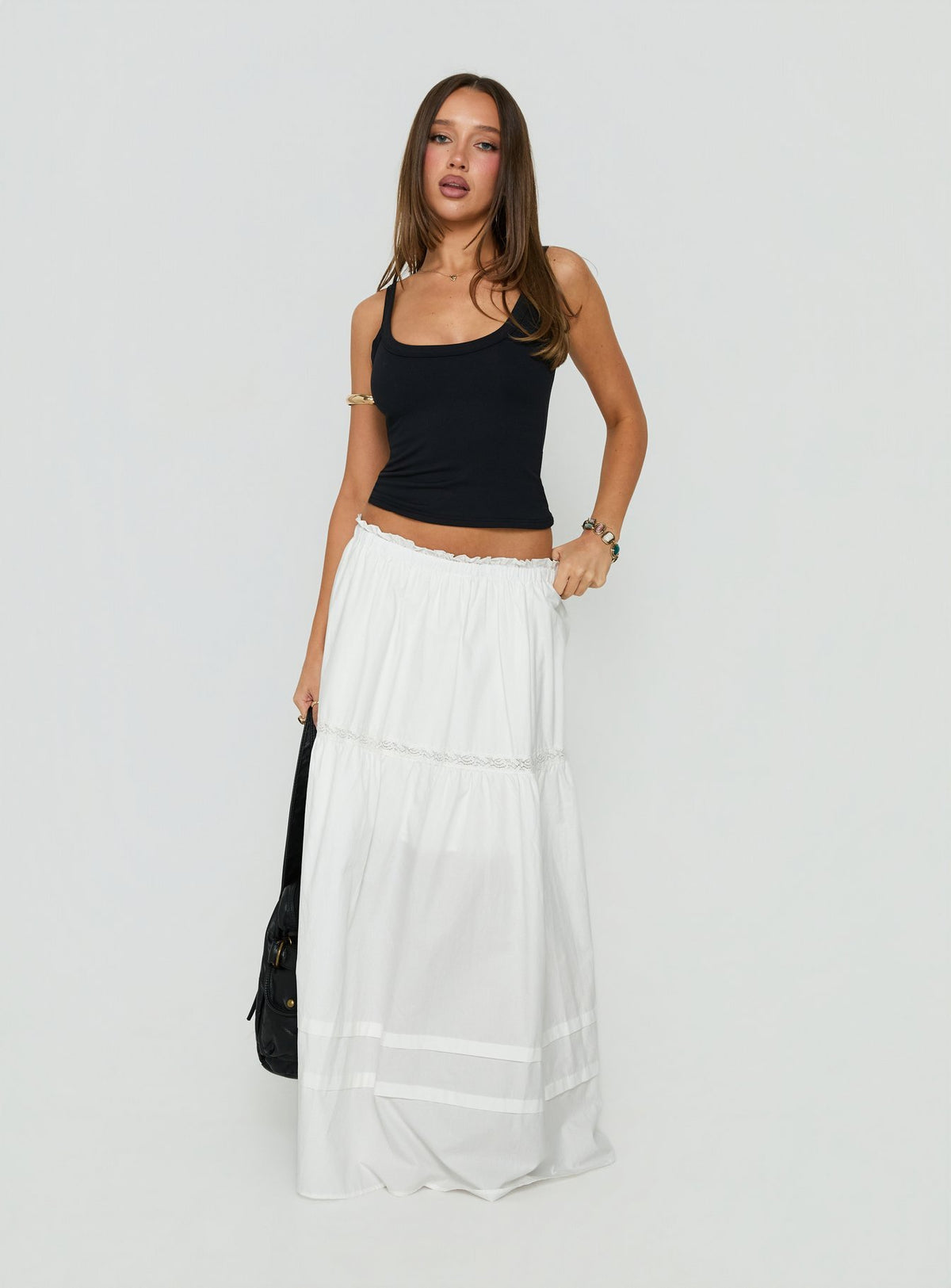 Showcasing the Meanna Tiered Maxi Skirt White in womens-skirts with maxi length front view of model wearing Princess Polly