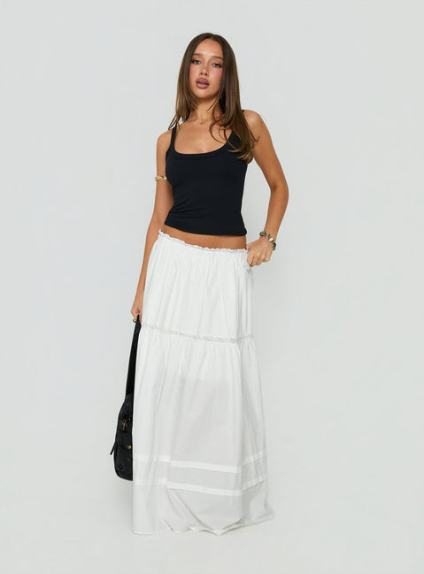 Showcasing the Meanna Tiered Maxi Skirt White in womens-skirts with maxi length front view of model wearing Princess Polly
