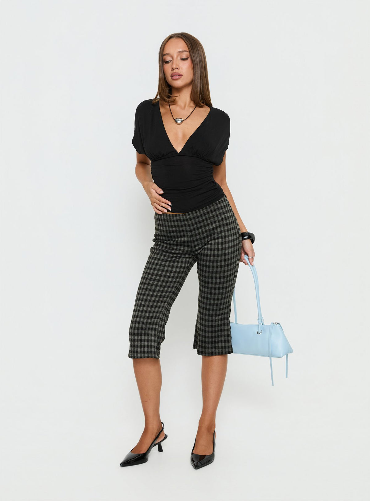 front view of model wearing Princess Polly Lights Are Off Capri Pants Multi Mid Rise Pants Pants 