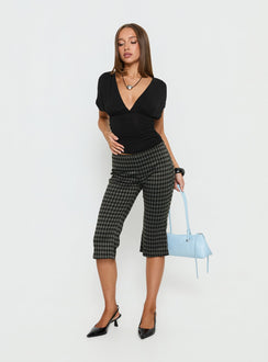 front view of model wearing Princess Polly Lights Are Off Capri Pants Multi Mid Rise Pants Pants 