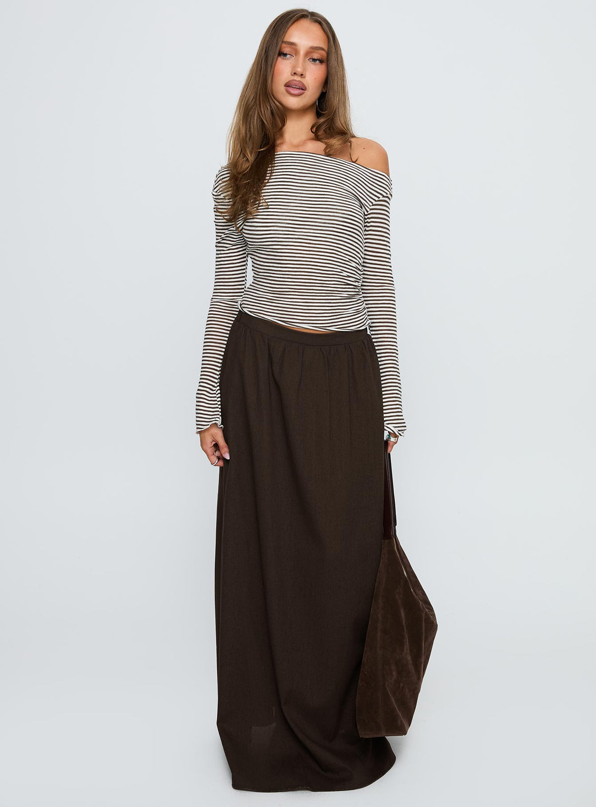   side view of model wearing Princess Polly Hallee Maxi Skirt Brown Maxi Skirts Skirts 