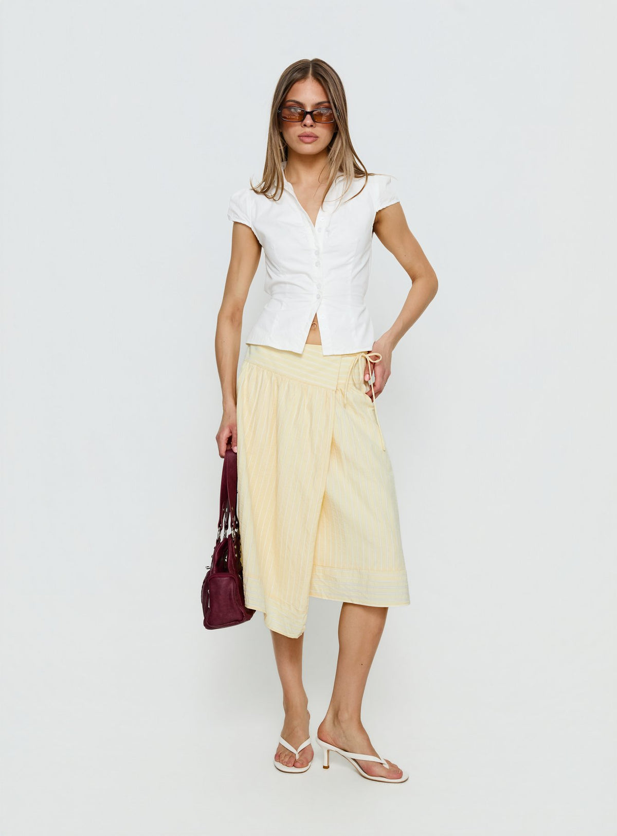   front view of model wearing Princess Polly Sunney Wrap Midi Skirt Yellow Midi Skirts Skirts 
