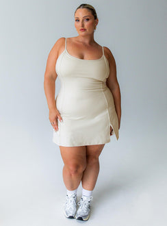 Beige activewear dress flattering scoop-neck shape that feels comfortable and unrestrictive built in shorts