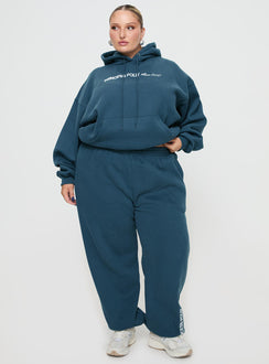 front view of model wearing Princess Polly Princess Polly Track Pants Block / Cursive Text Slate Curve Pants 