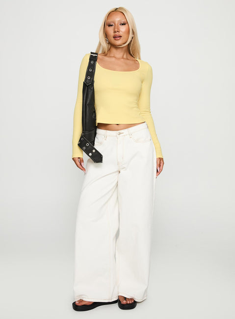back view of model wearing Princess Polly Baseline Long Sleeve Top Yellow Full Sleeves Scoop Neck 