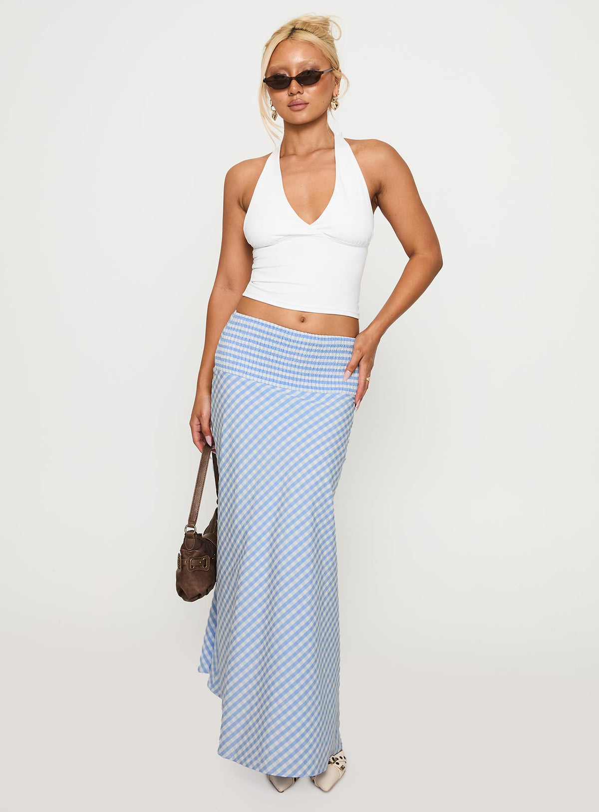   side view of model wearing Princess Polly Every Girl Shirred Maxi Skirt Blue Check Maxi Skirts Skirts 