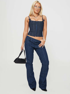 side view of model wearing Princess Polly Charismatic Low Rise Flared Jeans Dark Pinstripe Low Rise Jeans Jeans 