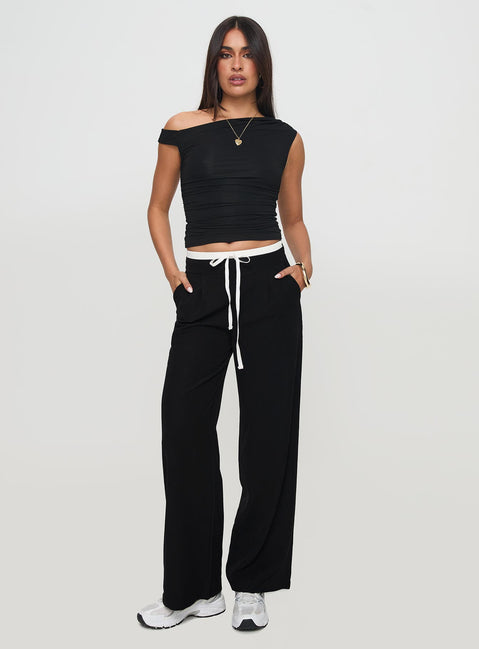 front view of model wearing Princess Polly Burna Pants Black High Rise Pants Pants 