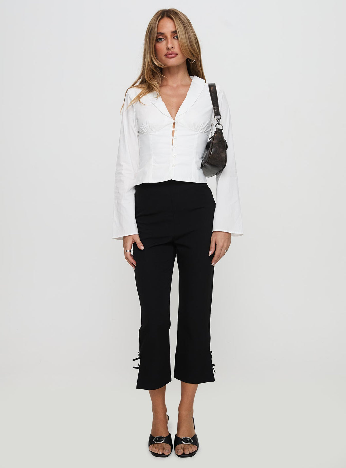 front view of model wearing Princess Polly Work Of Art Long Sleeve Top White Full Sleeves V-Neck 