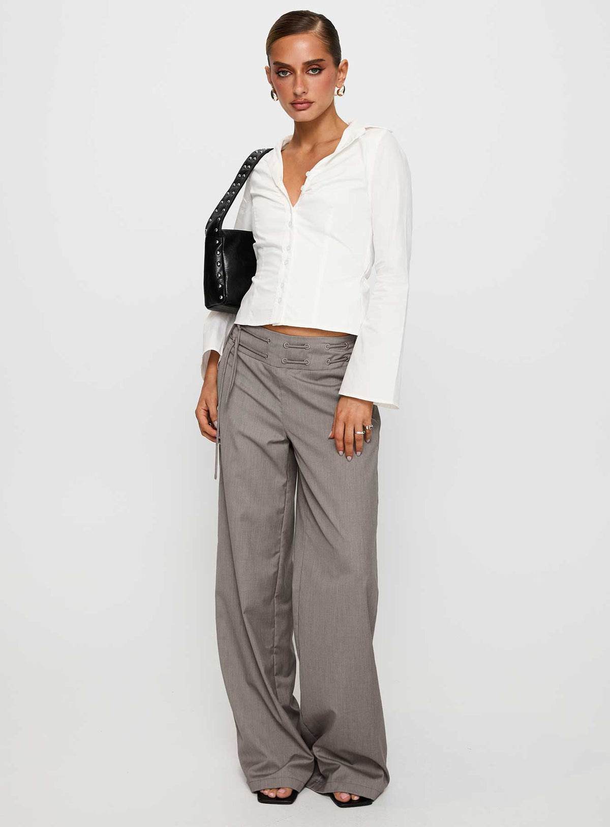 side view of model wearing Princess Polly Just Have Fun Wide Leg Pant Grey Tall High Rise Pants Pants 