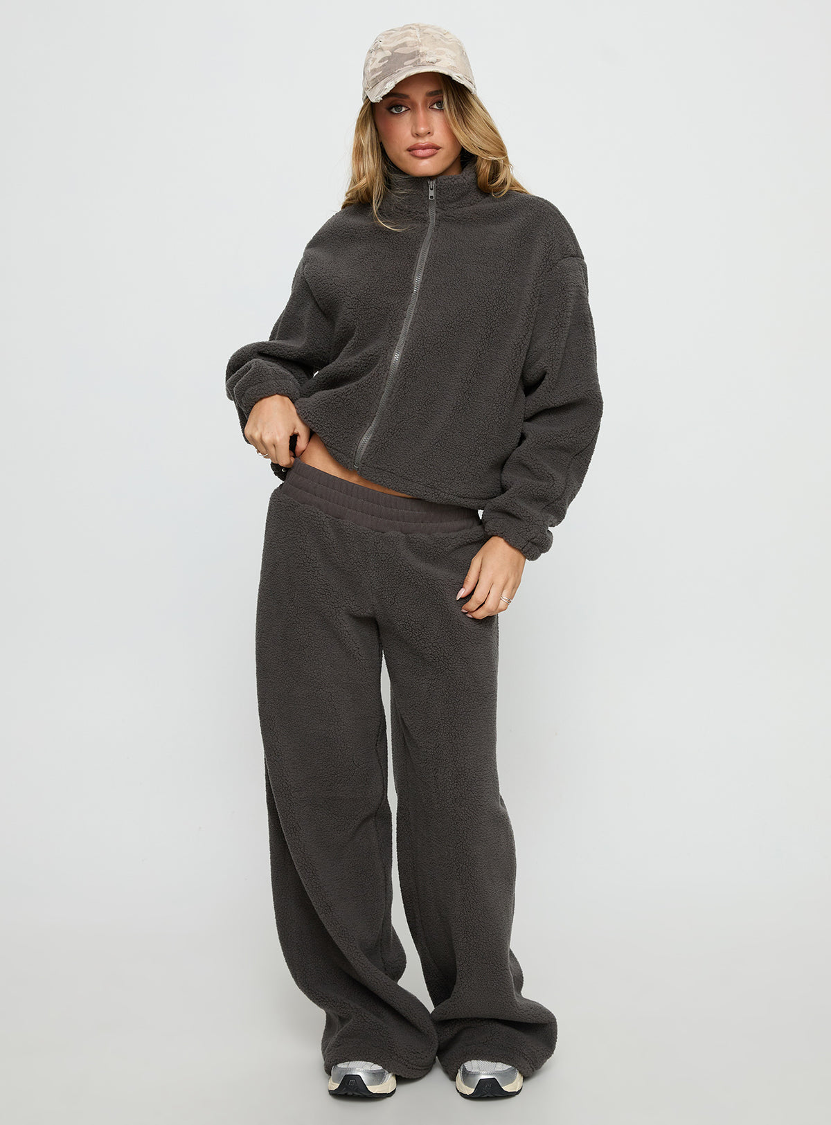 front view of model wearing Princess Polly Siberia Fleece Zip Up Jumper Charcoal regular Jumpers 