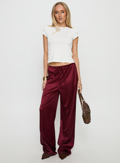 front view of model wearing Princess Polly Soulstar Satin Pants Wine Mid Rise Pants Pants 