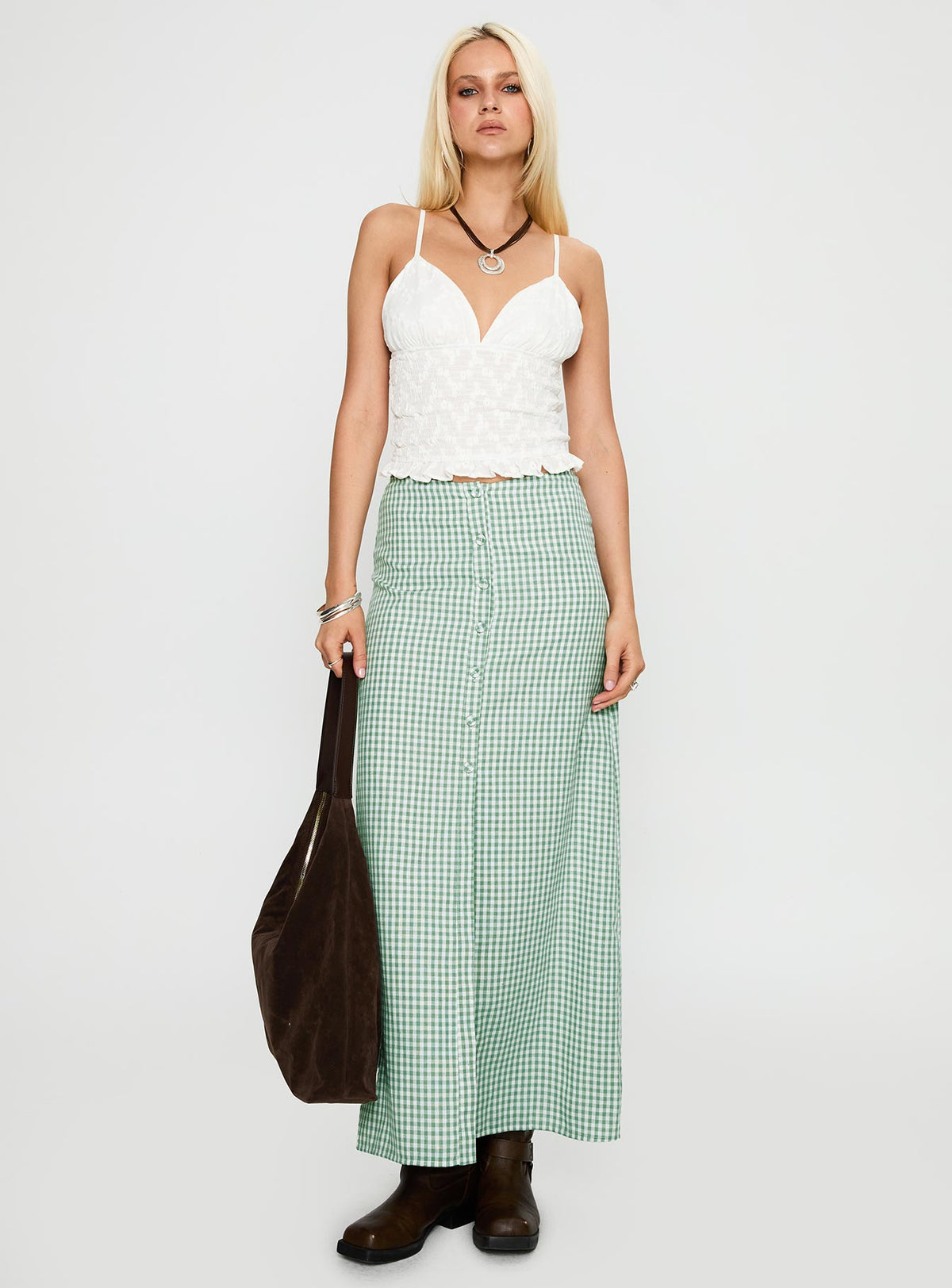 front view of model wearing Princess Polly Clued In Frill Detail Top White Sleeveless Plunger 