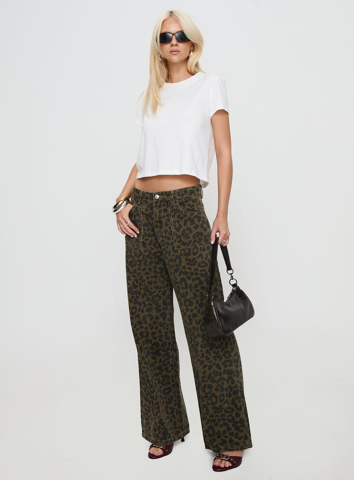 front view of model wearing Princess Polly Briony Low Rise Wide Leg Jean Leopard Mid Rise Jeans Jeans 