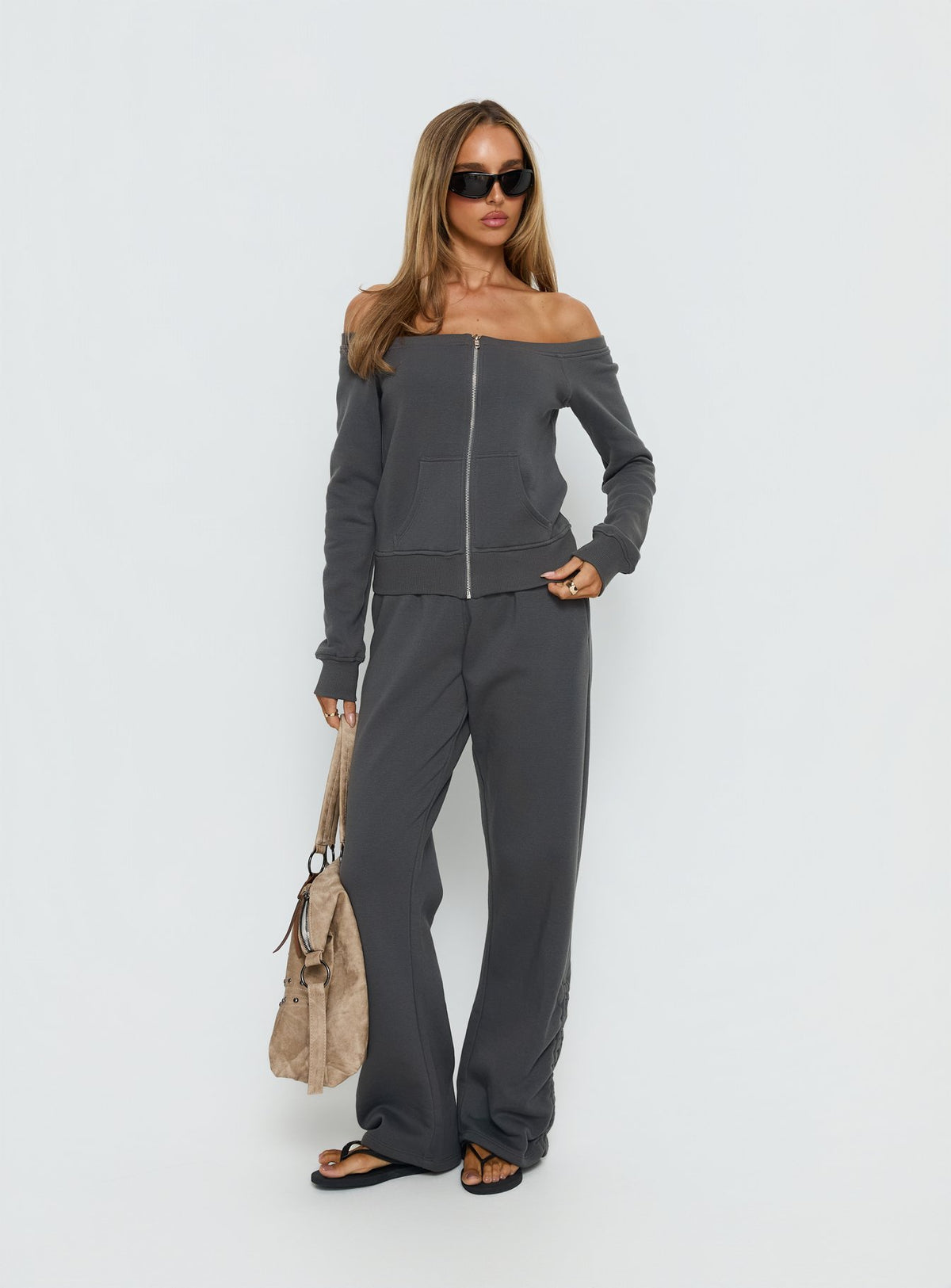 Presenting Rylan Low Rise Joggers Grey womens-regular-pants with low-rise waist side view of model wearing