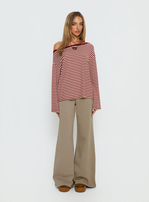 front view of model wearing Princess Polly Ralyssa Off Shoulder Long Sleeve Top Red Stripe Longline Jumpers Jumpers 