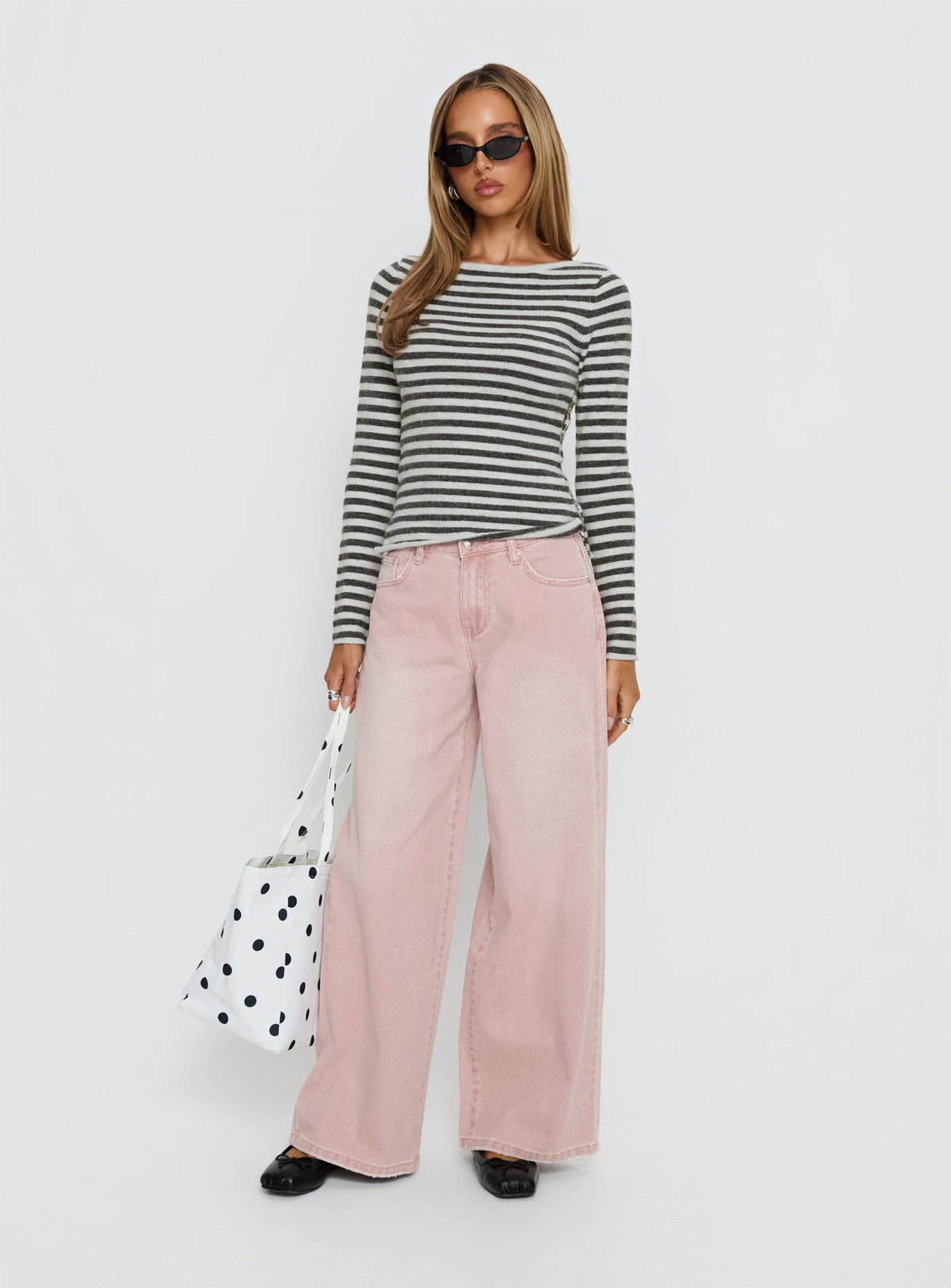 side view of model wearing Princess Polly Lucky Dip Mid Rise Straight Leg Jeans Washed Pink Mid Rise Jeans Jeans 