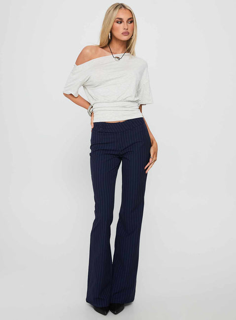 front view of model wearing Princess Polly Kinkirk Flared Pants Navy Pinstripe Low Rise Pants Pants 