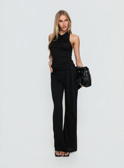 side view of model wearing Princess Polly Katiana Wrap Jersey Pants Black Mid Rise Pants Pants 