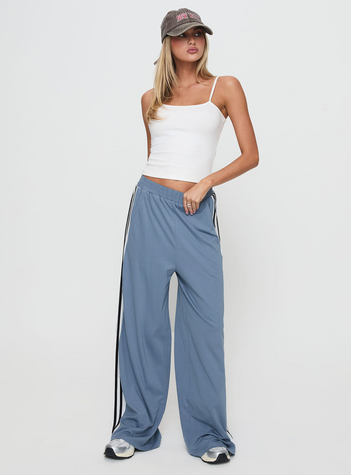 back view of model wearing Princess Polly Dime Track Pants Blue High Rise Pants Pants 